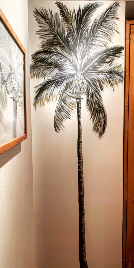 black and white palm tree mural